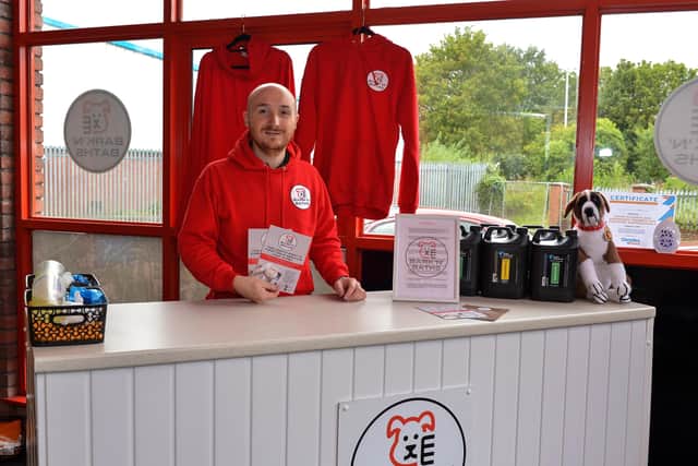 Aaron Griffiths, co-owner of Bark N’ Baths, a one stop canine wash, pictured at the service counter in Springtown Industrial Estate. DER2037GS – 009