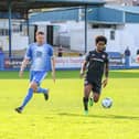 Derry City's Walter Figueira races away from Finn Harps defender Shane McEleney. Picture by Kevin Moore/Maiden City Images