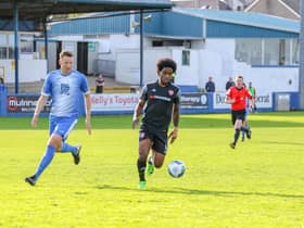 Derry City's Walter Figueira races away from Finn Harps defender Shane McEleney. Picture by Kevin Moore/Maiden City Images