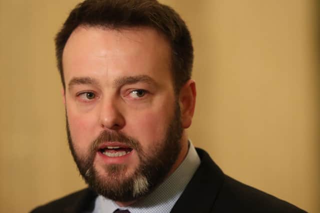 Colum Eastwood MP.
