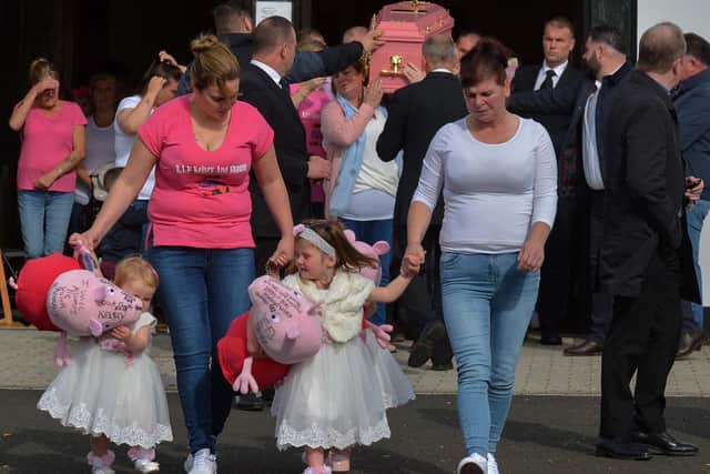 The coffin of three-year-old Kelsey Marie Stokes is carried from St Joseph’s Church in Galliagh after Requiem Mass yesterday morning. Kelsey died in a tragic road accident along with Shauna Stokes (17) in Horden, County Durham on Wednesday, September 2nd.  Kelsey was also buried from the Parish of the Three Patrons yesterday. DER2038GS – 0027