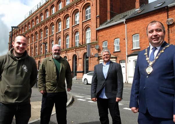 The Mayor Councillor Brian Tierney, pictured back in June with members of the Foyleside Community Covid-19 response team.  From left are Adrian Kelly, Mark Doherty and Min McCann.  Missing team members are Anne-Marie Bell and Darren O’Reilly.  0620-2033MT.