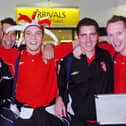 Derry City players arrive at George Best Belfast City Airport fresh from the five goal defeat of Gretna. Two goal hero Kevin Deery wears the jesters hat given to him by a fan following the game.