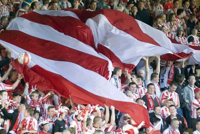 Over 3,000 of Derry City’s travelling fans get the party started as they prepare for kick-off against Gretna