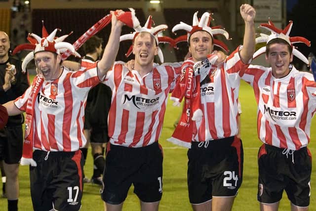 Derry City players, from left to right, Barry Molloy, Stephen O’Flynn, Darren Kelly and  Gareth McGlynn celebrate after crushing Gretna 5-1