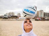 Hala Sanak (14), who plays for Gazas first-ever schoolgirls football club, received a Gaelic football skills session on the Gaza beach.