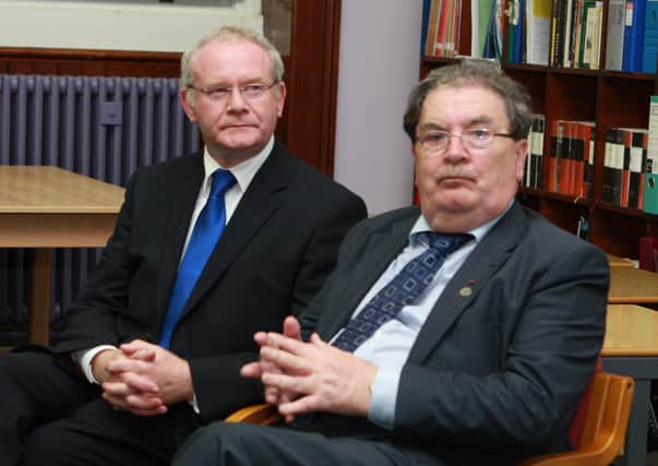 Political giants... Sinn Féin Leader and Deputy First Minister, Martin McGuinness with SDLP Leader and Nobel Laureate  John Hume at the launch of a book on the history of St Columb's College several years back.  (2409JB33)