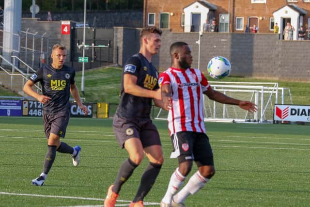 Derry City striker, James Akintunde holds off the challenge of St Pat's defender, Luke McNally during the first half of the Airtricity League clash at Brandywell. Picture by Kevin Moore (Maiden City Images).