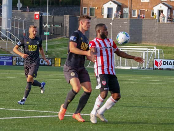 Derry City striker, James Akintunde holds off the challenge of St Pat's defender, Luke McNally during the first half of the Airtricity League clash at Brandywell. Picture by Kevin Moore (Maiden City Images).