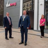 Derry City and Strabane District Council Mayor, Brian Tierney, who officially opened Derry's new state-of-the-art Visitor Information Centre at Waterloo Place, pictured with Don Wilmont,  Chair, Visit Derry, Catherine Crawley, centre manager and Odhran Dunne, Chief Executive, Visit Derry. Picture Martin McKeown. 23.09.20