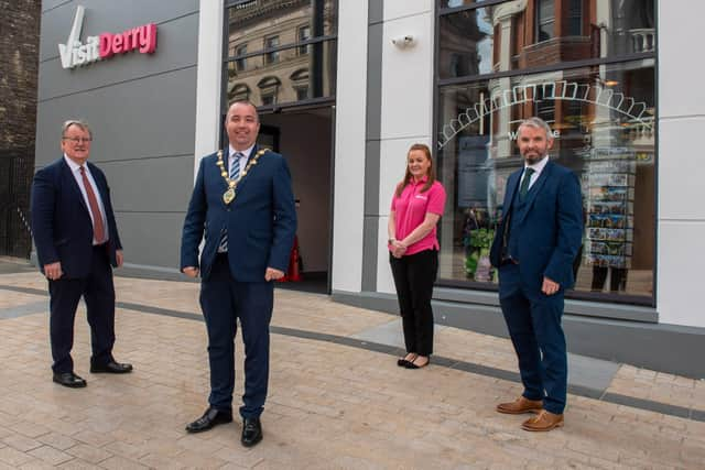 Derry City and Strabane District Council Mayor, Brian Tierney, who officially opened Derry's new state-of-the-art Visitor Information Centre at Waterloo Place, pictured with Don Wilmont,  Chair, Visit Derry, Catherine Crawley, centre manager and Odhran Dunne, Chief Executive, Visit Derry. Picture Martin McKeown. 23.09.20