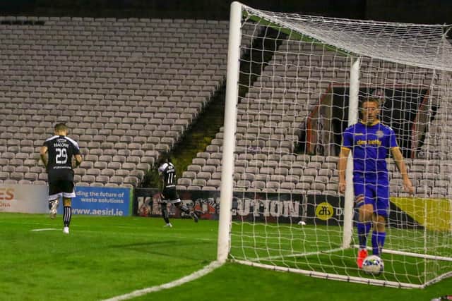 James Akintunde celebrates his second minute strike at Dalymount as Bohs keeper, James Talbot picks the ball out of the net.