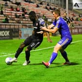 James Akintunde holds off the challenge of Bohemians defender, Dan Casey at Dalymount Park. Picture by Kevin Moore (Maiden City Images).