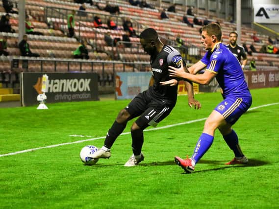 James Akintunde holds off the challenge of Bohemians defender, Dan Casey at Dalymount Park. Picture by Kevin Moore (Maiden City Images).