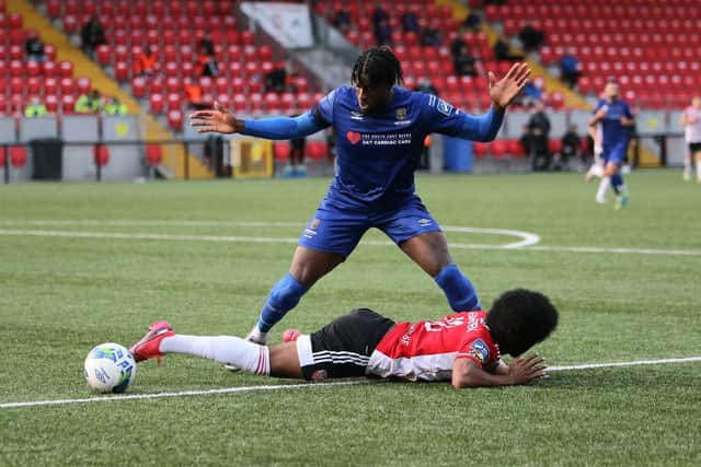 Walter Figueira is fouled inside the penalty box by Tunmise Sobowale in the first half of the victory over Waterford. Picture by Kevin Moore (Maiden City Images)