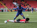 Walter Figueira is fouled inside the penalty box by Tunmise Sobowale in the first half of the victory over Waterford. Picture by Kevin Moore (Maiden City Images)
