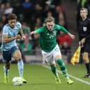 Ireland's Ronan Curtis gets away from Northern Ireland's Jamal Lewis.