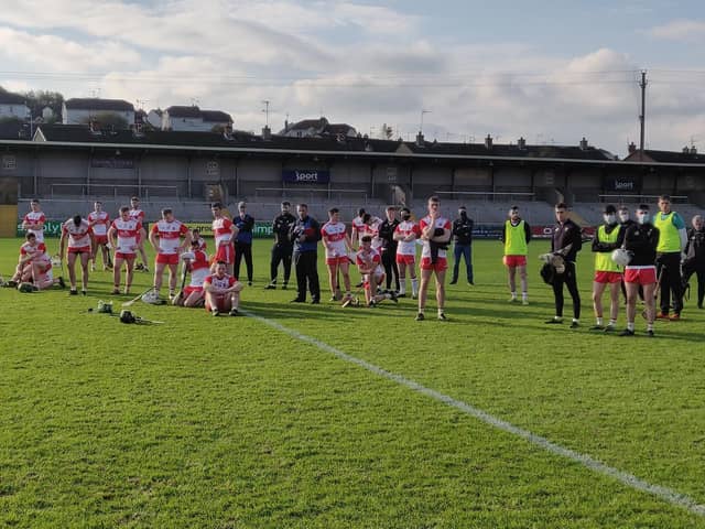 Disappointed Derry players following their defeat to Down in the League 2B final in the Athletic Grounds