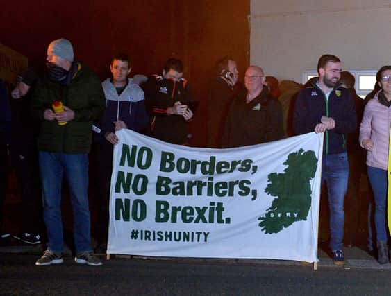 Border Communities Against Brexit supporters attend the demonstration held at Bridgend on Wednesday evening last.  DER4119GS - 028