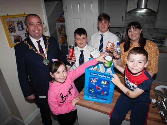 Mayor of Derry City and Strabane District Council, Councillor Brian Tierney pictured with his wife Cheryl and family launching the new DCSDC Indoor Recycling Bags currently being rolled out to homes across the district to help people recycle in their homes.