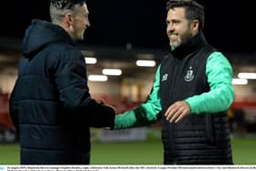 Aaron McEneff and Stephen Bradley embrace after Shamrock Rovers victory over Derry City at Brandywell.