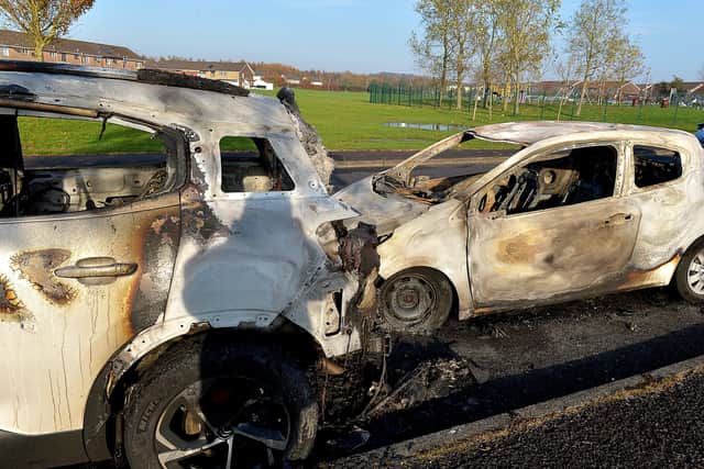 Cars torched by youths in the Ederowen Park area of Galliagh during disturbances on Friday evening last.  Photo: George Sweeney DER2045GS – 027
