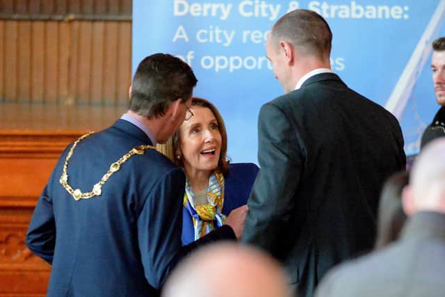 House of Representatives speaker Nancy Pelosi in conversation with the then Mayor of Derry and Strabane Colr John Boyle and Mark H Durkan MLA in the Guildhall in April 2019. DER1619GS-053
