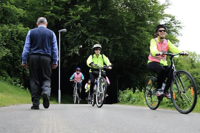 A group of cyclists under guidance from Cycling Made Easy's Monica Downey, making their way through Derry's greenway network.