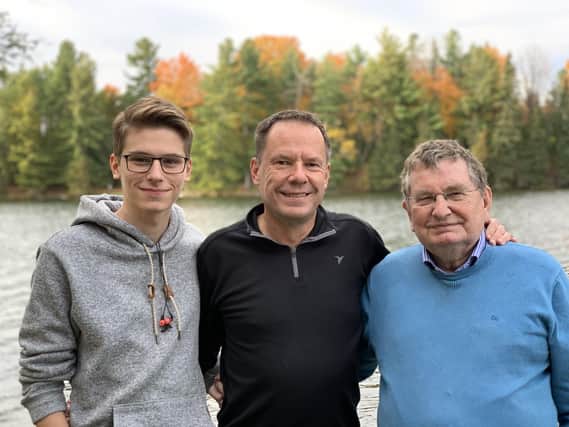 Three generations of James Lamonts.  The Rev Jim Lamont pictured with his grandson Ryan James and his son Philip James.