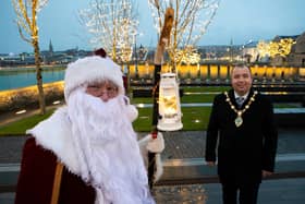 Mayor of Derry City and Strabane District Council and Santa Claus preparing for this year's Virtual Christmas Lights Switch on in Derry and Strabane.