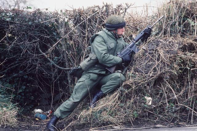 An Irish army soldier on patrol on the border in 1987.