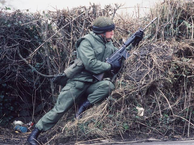 An Irish army soldier on patrol on the border in 1987.