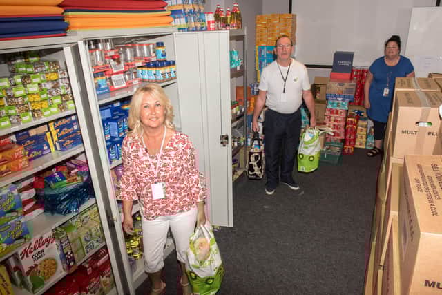 MAY 2020 - Ciara Ferguson, Martin Connollly and Lorraine McWilliams who work in the Ballyarnett Community food distribution team. The responses of community and voluntary teams in helping to tackle food poverty across the north west was lauded at the meeting. Picture Martin McKeown 0720