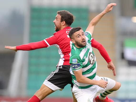 UP IN THE AIR . . . Danny Lafferty pictured challenging Derry City's Darren Cole in Tallaght last weekend, says his future is undecided. Photograph by Kevin Moore.