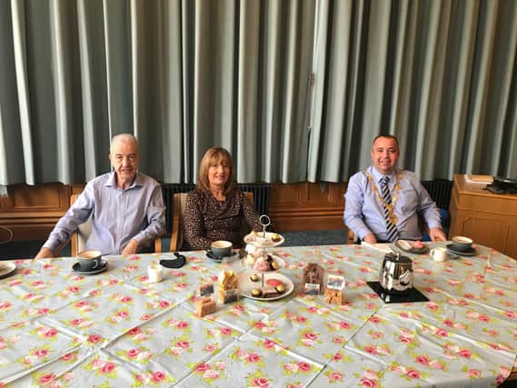 Mayor of Derry City and Strabane District Council, Councillor Brian Tierney, with parents Brian and Mary at last month's Positive Ageing Month Virtual Tea Dance in the Guildhall.