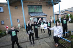 ANTI-BULLYING WEEK. . . . .Marking Anti Bullying Week at St. Josephâ€TMs Boys School on Thursday are Year 8 students Ciefer Doran, Tony Lyttle, Shea McCafferty, Odhran Patton and Liam McCauley with Rachel McIntyre and Rebecca Quigley. (Photos: Jim McCafferty Photography)