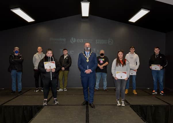 The Mayor of Derry and Strabane Colr. Brian Tierney pictured members of the Flames Of Passion Voice Of Our Youth 2020 production team at the premier showing of the film in Studio 2 on Tuesday evening last. From left are Keith O’Grady, Gary Curran, Youth Support Worker in Charge, Shanice Harkin, Aodhán Roberts, Oliver Green, Artistic Director, Studio 2, Faye Norris, Sean Canning and Callum Gallagher.  Photo: George Sweeney DER2048GS –   009