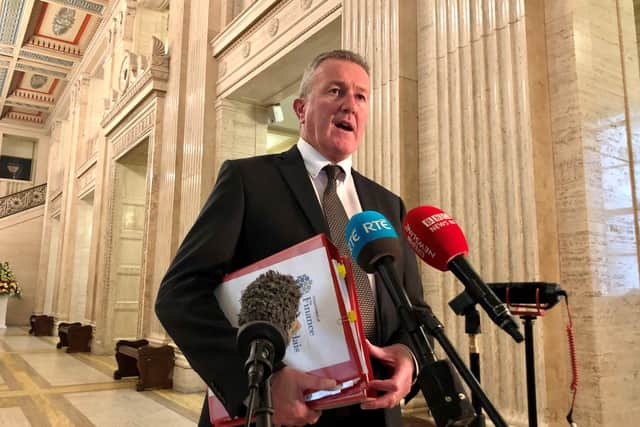 Finance Minister Conor Murphy speaking at a press conference at Parliament Buildings in Belfast.