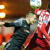 Derry City's Jack Malone wins this header ahead of Sligo Rovers striker, Junior Ogedi-Uzokwe.