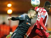 Derry City's Jack Malone wins this header ahead of Sligo Rovers striker, Junior Ogedi-Uzokwe.