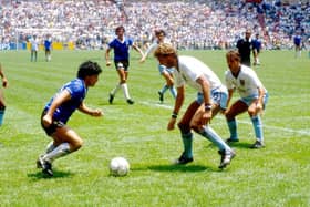 The late Diego Maradona in action against England in the 1986 World Cup Finals.