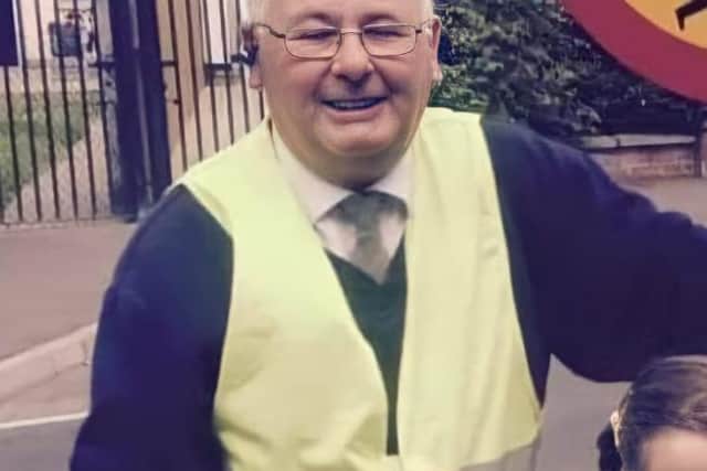 Seamus on duty as the lollipop man at Long Tower Primary School.