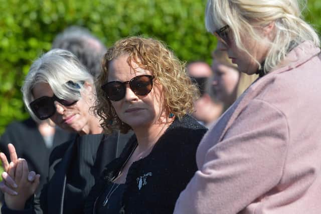 Geraldine Mullan pictured at the funeral of her husband, son and daughter in August 2020.