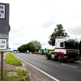 Traffic crossing the border between the Republic of Ireland and Northern Ireland in the village of Bridgend, Co Donegal. (Brian Lawless/PA Wire)