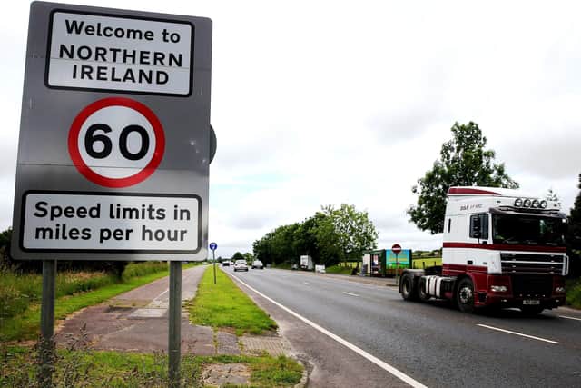 Traffic crossing the border between the Republic of Ireland and Northern Ireland in the village of Bridgend, Co Donegal. (Brian Lawless/PA Wire)