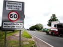 Traffic crossing the border between the Republic of Ireland and Northern Ireland in the village of Bridgend, Co Donegal. (Brian Lawless/PA Wire)