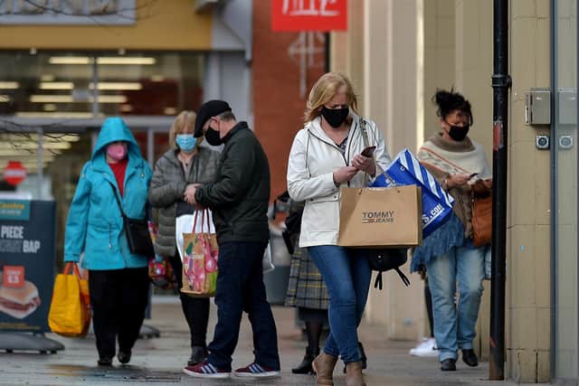 Shoppers in Derry’s city centre a few weeks ago before the restrictions came into force.  Photo: George Sweeney  DER2047GS - 003