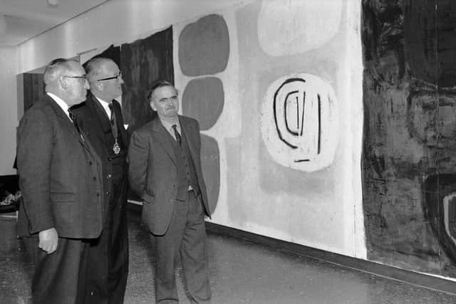 1962... The mural is officially unveiled at the recently opened Altnagelvin Hospital. William Scott is pictured on the right.