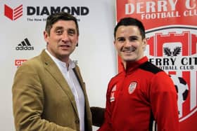 Derry City boss, Declan Devine and defender, Ciaran Coll after the St Johnston man signed a new two year deal.