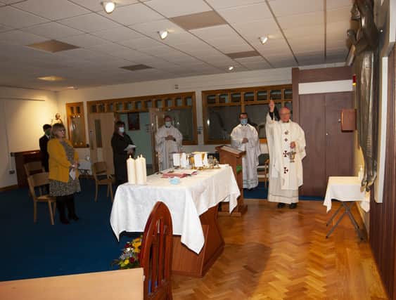Dr. Donal McKeown, Bishop of Derry, pictured blessing the new oratory during Tuesdayâ€TMs Mass of Dedication at St. Josephâ€TMs Boys School.